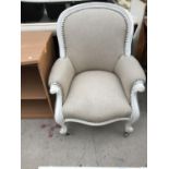 A SHABBY CHIC BEIGE UPHOLSTERED NURSING CHAIR