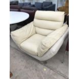 A RETRO CREAM LEATHER ARMCHAIR