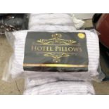 SEVEN PACKS OF 'HOTEL PILLOWS' (2 PER PACK)