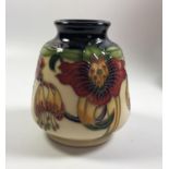 A MOORCROFT POTTERY 'ANNA LILY' PATTERN VASE, HEIGHT 8.5CM