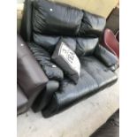 A BLACK LEATHER TWO SEATER SOFA