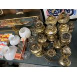 A LARGE COLLECTION OF OIL LAMPS AND OIL LAMP PARTS