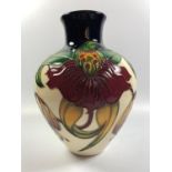 A MOORCROFT POTTERY 'ANNA LILY' PATTERN VASE, HEIGHT 19CM