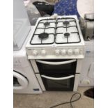 A DOUBLE OVEN AND FOUR GAS RING COOKER IN WORKING ORDER