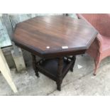 AN OCTAGONAL MAHOGANY OCCASIONAL TABLE WITH GALLERIED SHELF
