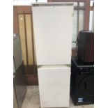 A WHITE FRIDGE FREEZER