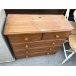 A PINE CHEST OF TWO SHORT AND THREE LONG DRAWERS