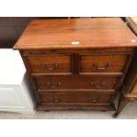 A PINE CHEST WITH TWO SHORT AND TWO LONG DRAWERS