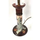 A MOORCROFT POTTERY TULIP PATTERN CANDLESTICK SHAPE LAMP BASE, HEIGHT INCLUDING FITTING 29.5CM