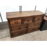 A PINE TOUCANS MADE IN MEXICO SIDEBOARD WITH THREE SHORT AND FOUR LONG DRAWERS