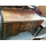 A WALNUT SIDEBOARD WITH SPLASHBACK, TWO DOORS AND TWO DRAWERS