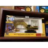 A NORSCOT MODEL CAT 5110B EXCAVATOR METAL TRACKS 1-50 SCALE REF NO 55098 BOXED AND IN MINT CONDITION