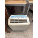 A DEHUMIDIFIER UNIT IN WORKING ORDER