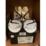 A PAIR OF WHITE SANDALS, SIZE 5 WITH BOX