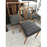 THREE TEAK DINING CHAIRS