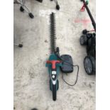 A BOSCH ELECTRIC HEDGE TRIMMER WITH CHARGER IN WORKING ORDER