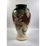 A MOORCROFT POTTERY 'ANNA LILY' PATTERN VASE, HEIGHT 26CM