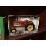 AN ERTL MASSEY HARRIS 555 SPECIAL , REF NO 1105, 1-16 SCALE, BOXED MODEL AND IN MINT CONDITION