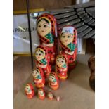 A GRADUATED COLLECTION OF WOODEN RUSSIAN DOLLS