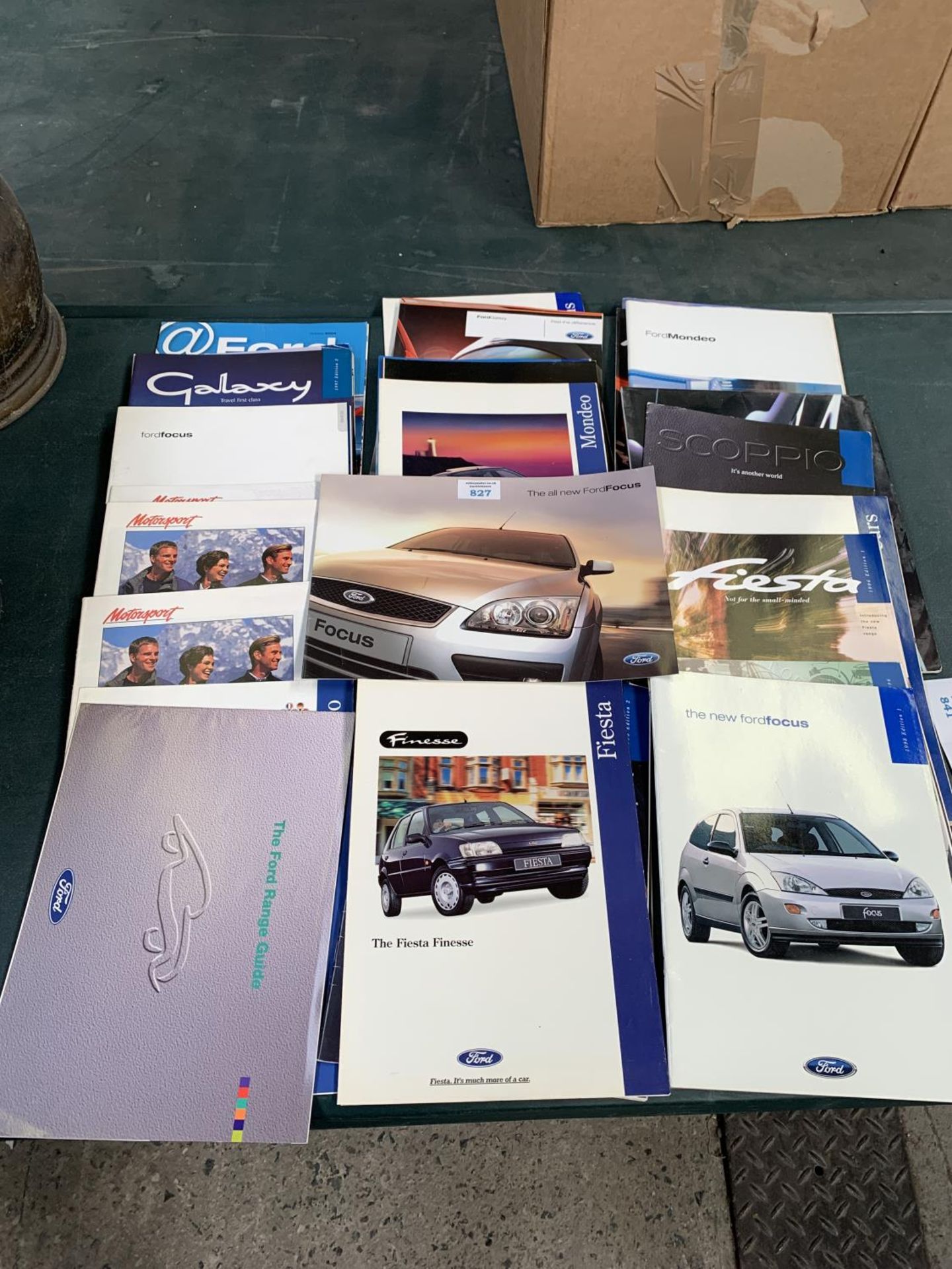 A COLLECTION OF FORD CAR MAGAZINES AND BOOKLETS