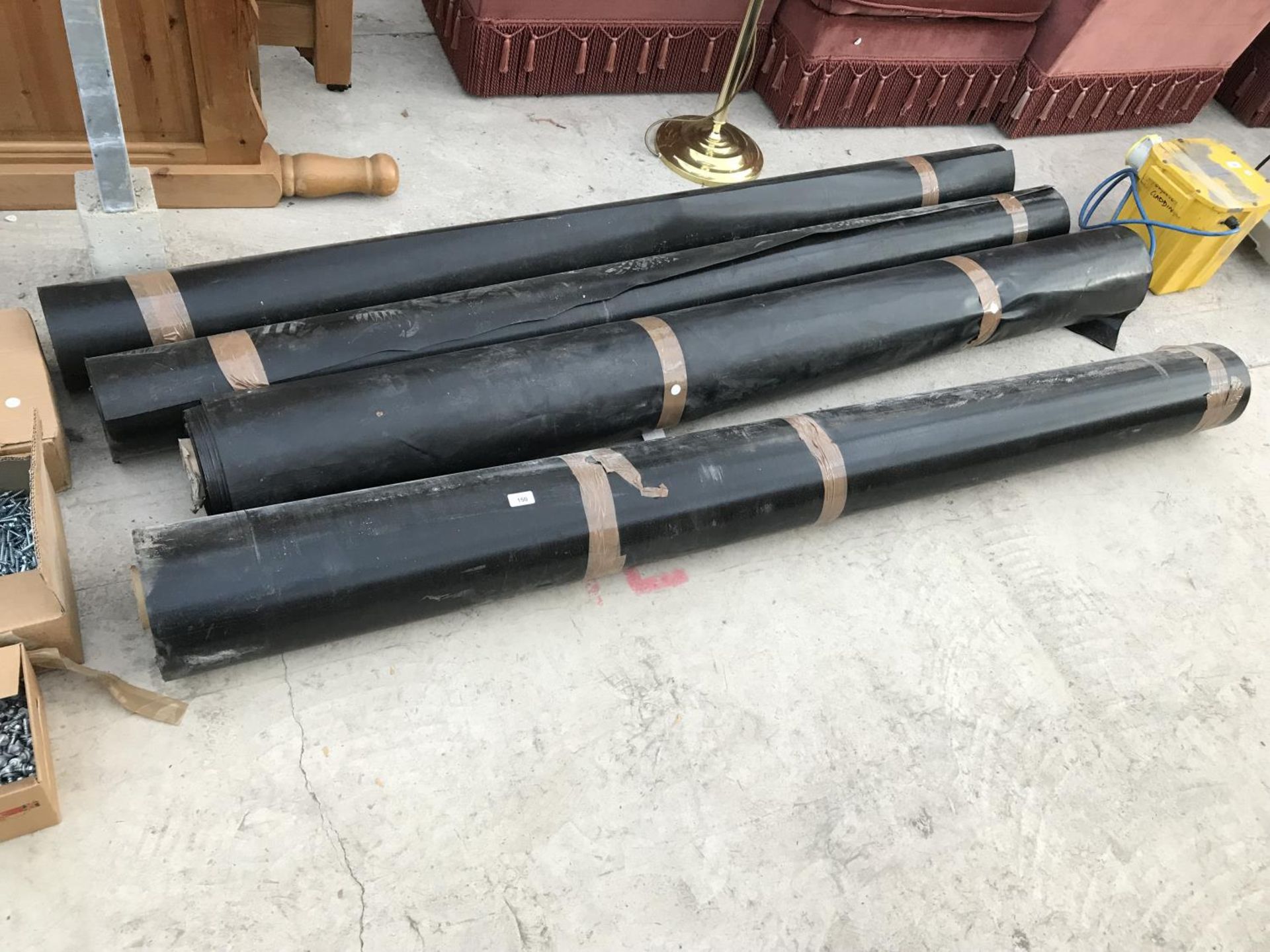 FOUR ROLLS OF PLASTIC MEMBRANE