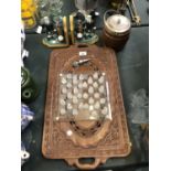 A CARVED WOODEN DRINKS TRAY, GOLFER BOOKENDS, BISCUIT BARREL AND CHESS SET