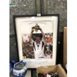 A FRAMED AND SIGNED MARTIN JOHNSON PHOTO