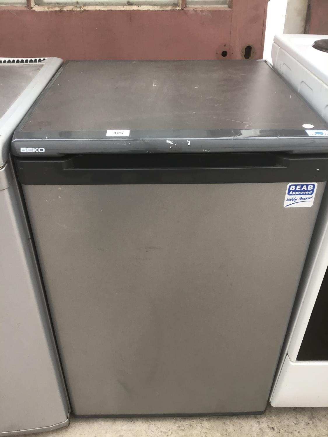 A SILVER BEKO UNDER COUNTER FRIDGE IN WORKING AND CLEAN ORDER