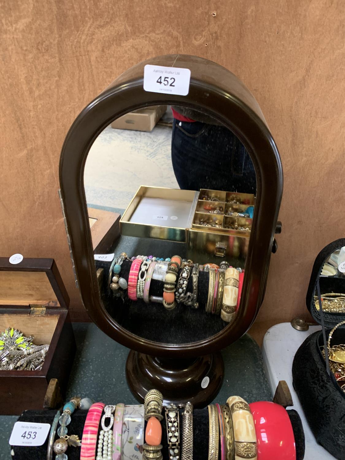 A RETRO ROTATING DOUBLE SIDED MIRROR, OPENS INTO A JEWELLERY BOX