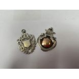 TWO SILVER AND GOLD POCKET WATCH FOBS