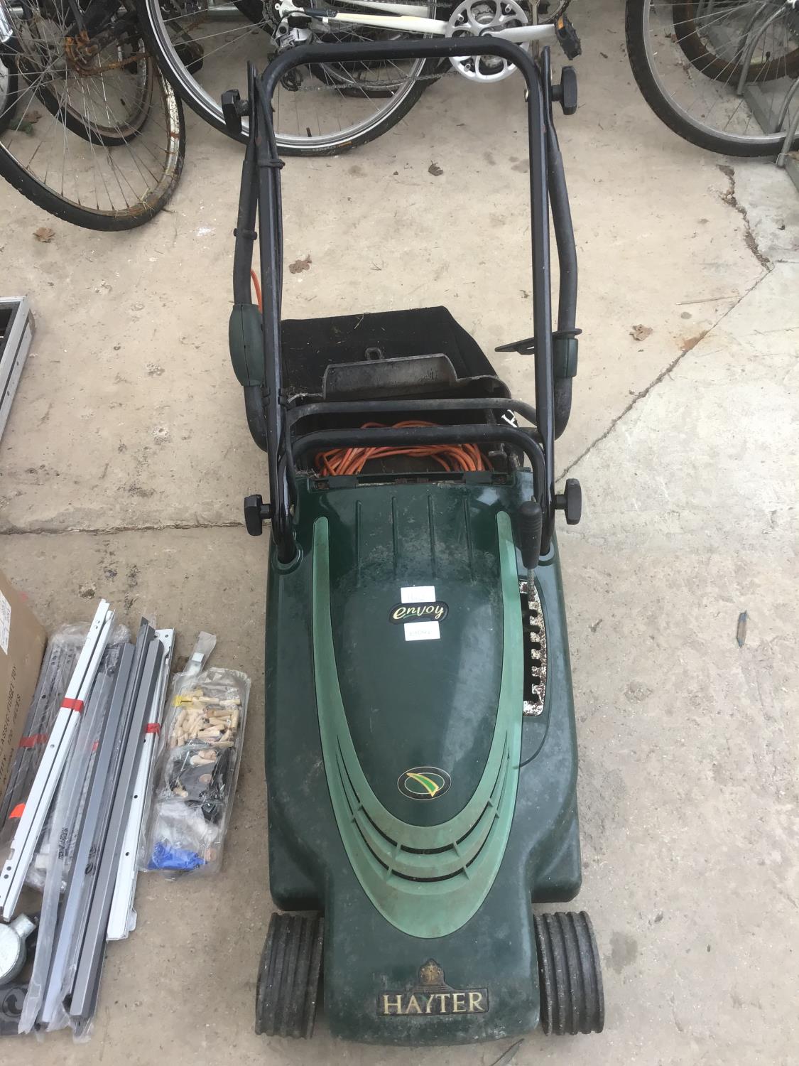 AN ENVOY ELECTRIC MOWER WITH GRASS BOX IN WORKING ORDER