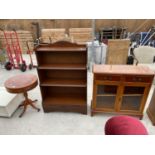 THREE ITEMS - A YEW WOOD DRUM TABLE, A MAHOGANY BOOK SHELF AND A YEW WOOD HALL CABINET WITH TWO