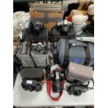 A COLLECTION OF ASSORTED CAMERAS AND CASES TO INCLUDE EXAMPLES BY CANNON AND PENTAX ETC