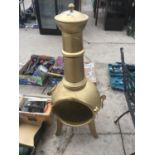 A GOLD PAINTED CHIMINEA