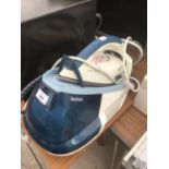 A TEFAL STEAM IRON WITH BASE IN WORKING ORDER