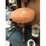 A MAHOGANY AND ORANGE FLORAL UPHOLSTERED PIANO STOOL