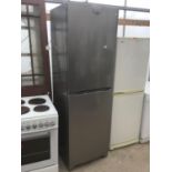 A SILVER INDESIT FRIDGE FREEZER IN WORKING ORDER