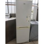 A ZANUSSI FRIDGE FREEZER IN WORKING AND CLEAN CONDITION