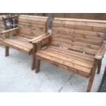 A PAIR OF TWO SEATER WOODEN GARDEN BENCHES