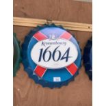 A COLLECTABLE METAL BEER BOTTLE CAP 'KRONENBOURG 1664' SIGN