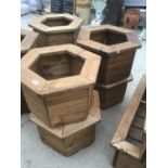 FOUR HEXAGONAL WOODEN PLANTERS