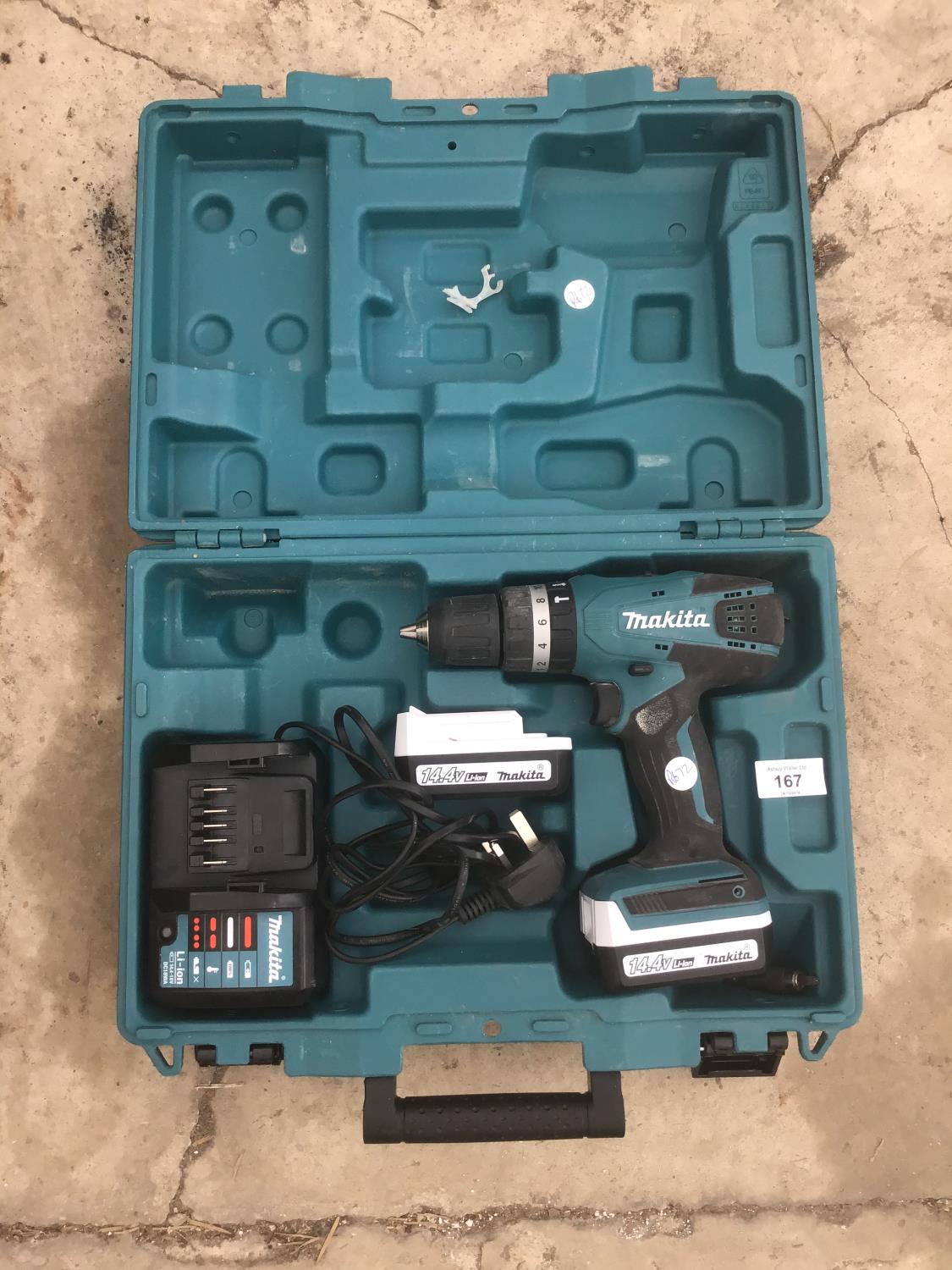 A MAKITA CORDLESS DRILL WITH TWO BATTERIES AND CHARGER IN A CASE