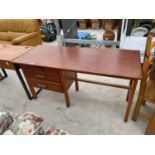 A MAHOGANY DESK WITH THREE DRAWERS