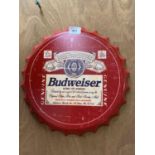 A COLLECTABLE METAL BEER BOTTLE CAP 'BUDWEISER' SIGN