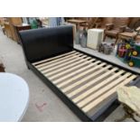 A BLACK LEATHER DOUBLE BED