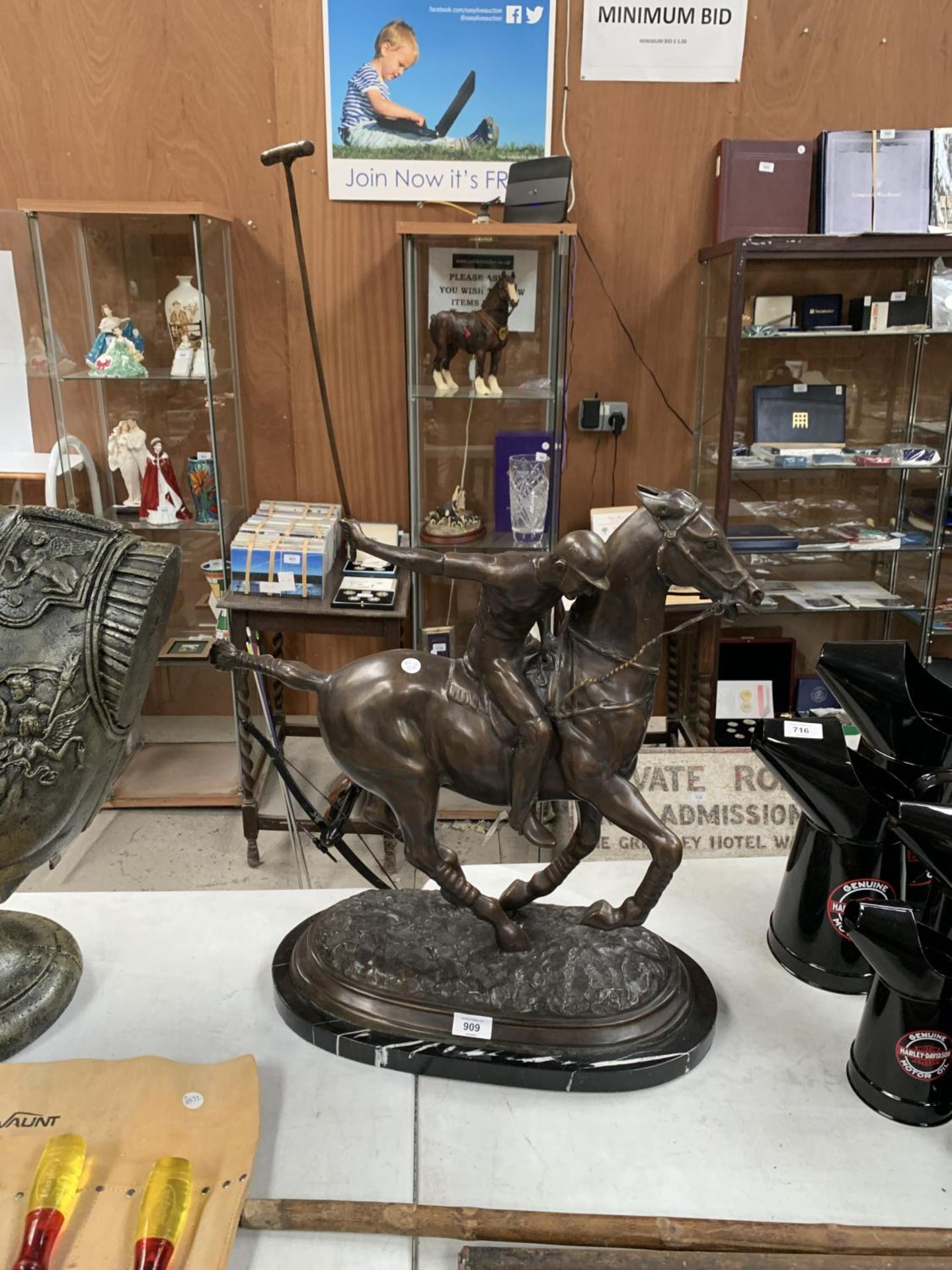 A LARGE BRONZE MODEL OF A POLO PLAYER ON HORSEBACK, HEIGHT 82CM