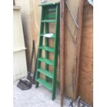A VINTAGE SIX STEP GREEN PAINTED WOODEN STEP LADDER AND A VINTAGE FOLDING WOODEN TABLE