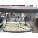 A FISH TANK AND PUMP IN WORKING ORDER