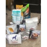 A QUANTITY OF DOG FOOD TO INCLUDE HILLS, ROYAL CANIN ETC