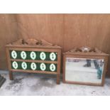 A ORNATE PINE MIRROR AND A TILED SPLASH BACK